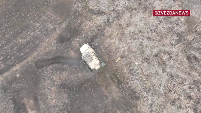 Бойцы показали точное попадание FPV-дрона в боевую машину ВС