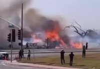 Как американцы тушат пожар в ЛА с помощью воздушной техники