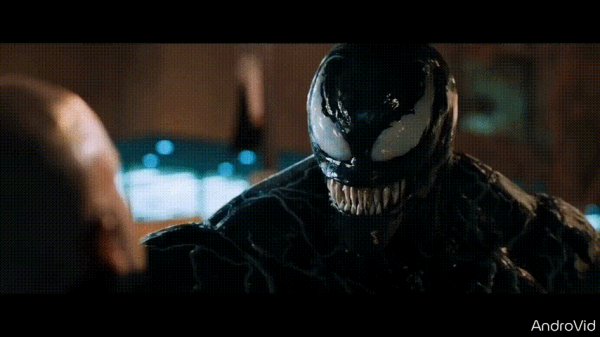 Venom licks a man