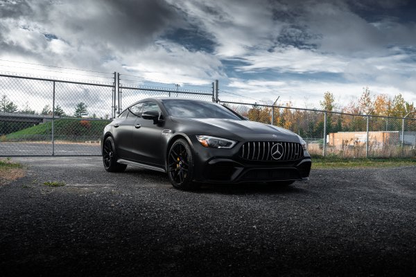 Mercedes-amg-gt-63s-4-door-black-sky-clouds