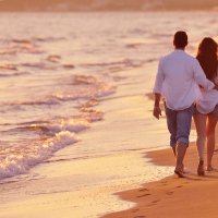 depositphotos 53085997-stock-photo-young-couple-on-beach-have