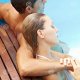 Couple-relaxing-pool-24683635