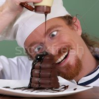 stock-photo-funny-young-chef-added-chocolate-sauce-at