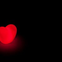 depositphotos 13147716-stock-photo-glowing-love-heart-on-bl