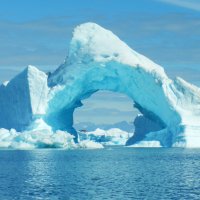 Nature Huge blue iceberg in the ocean 130934