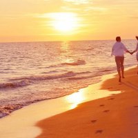 depositphotos 53268139-stock-photo-young-couple-on-beach-have