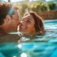 Attractive-young-couple-love-smiling-indoor-swimming-pool-ge